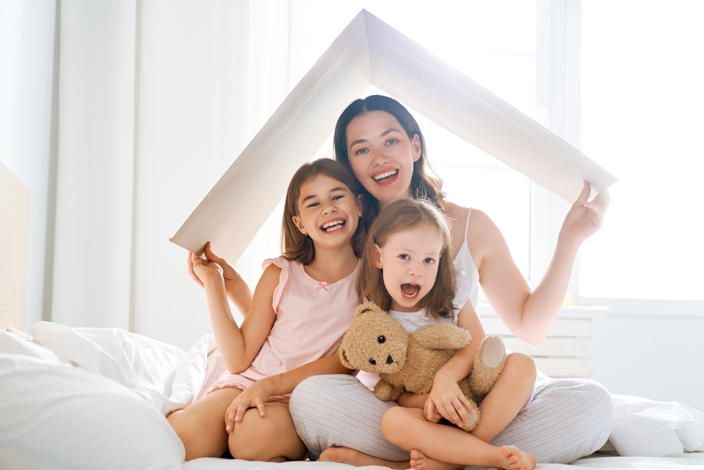 Mother and children playing. Schank Family Law